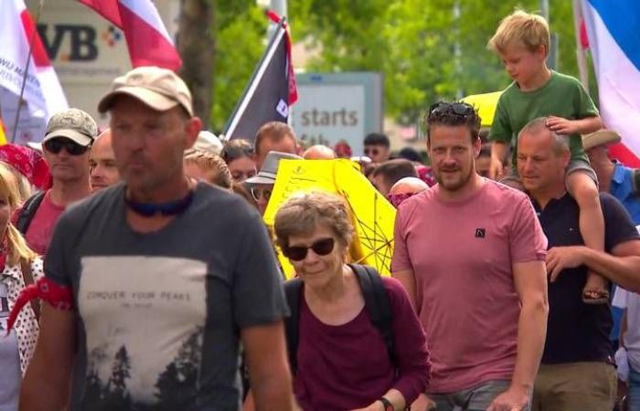 Protesters wear farmer’s handkerchief during protest against nitrogen plans