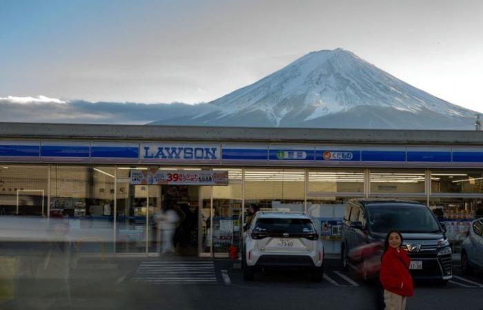 Japanese town installs screen over view of Mount Fuji after tourist nuisance