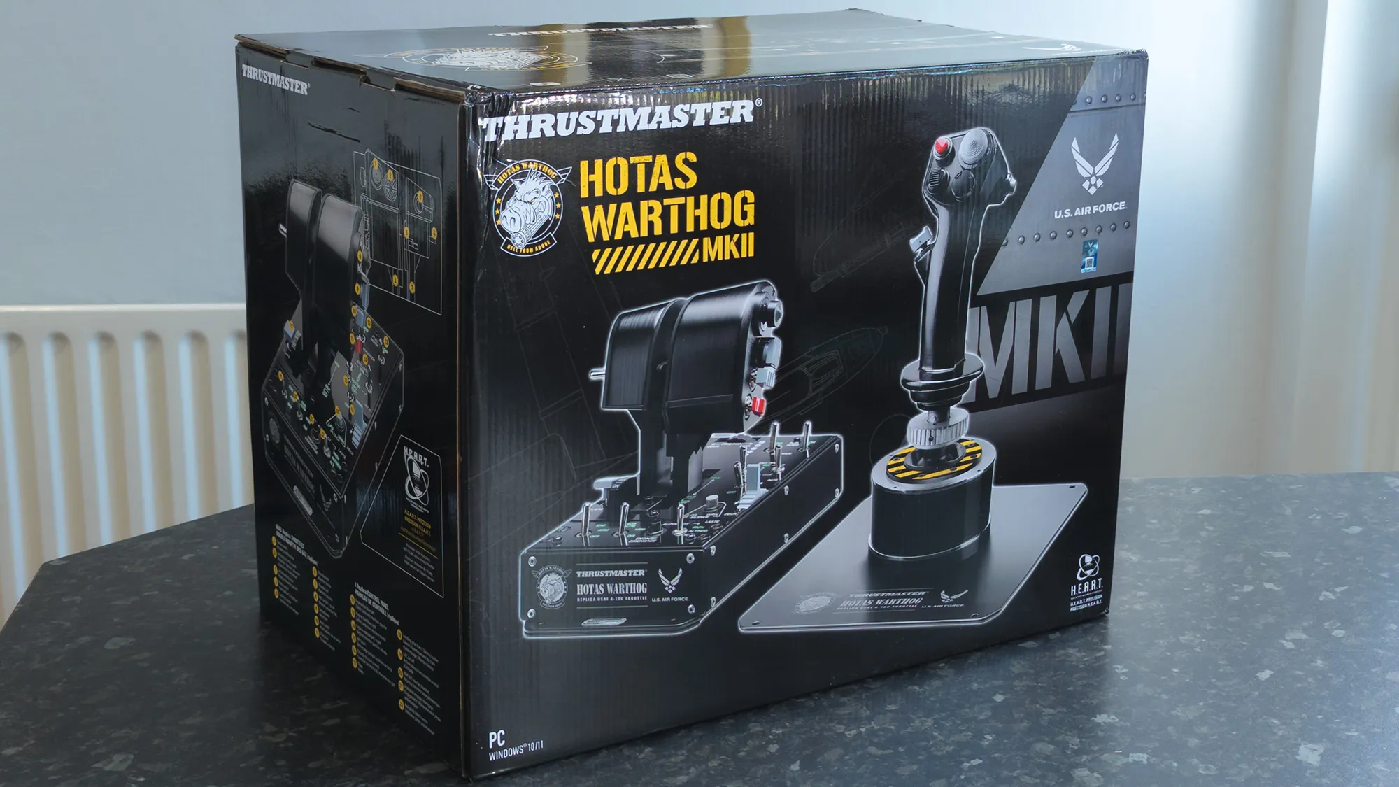 Thrustmaster HOTAS WARTHOG MK II in retail box on a marble surface