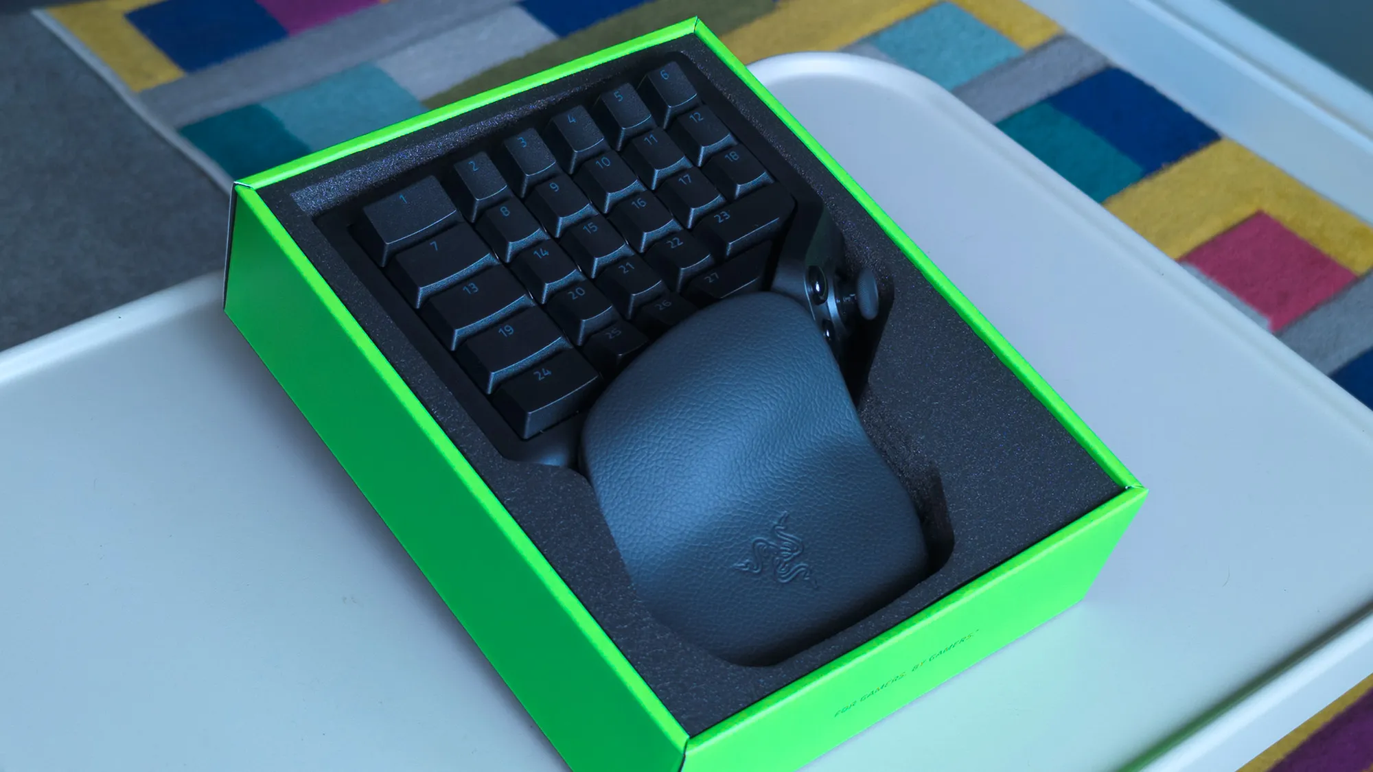 Razer Tartarus V2 Pro displayed in its green retail box