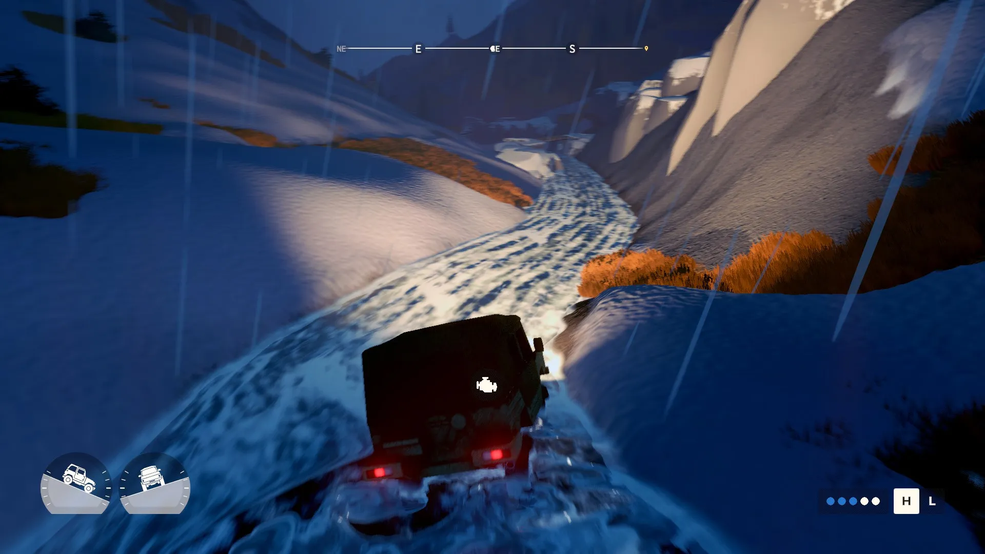 A 4x4 in Over The Hill drives up a river at night as it rains