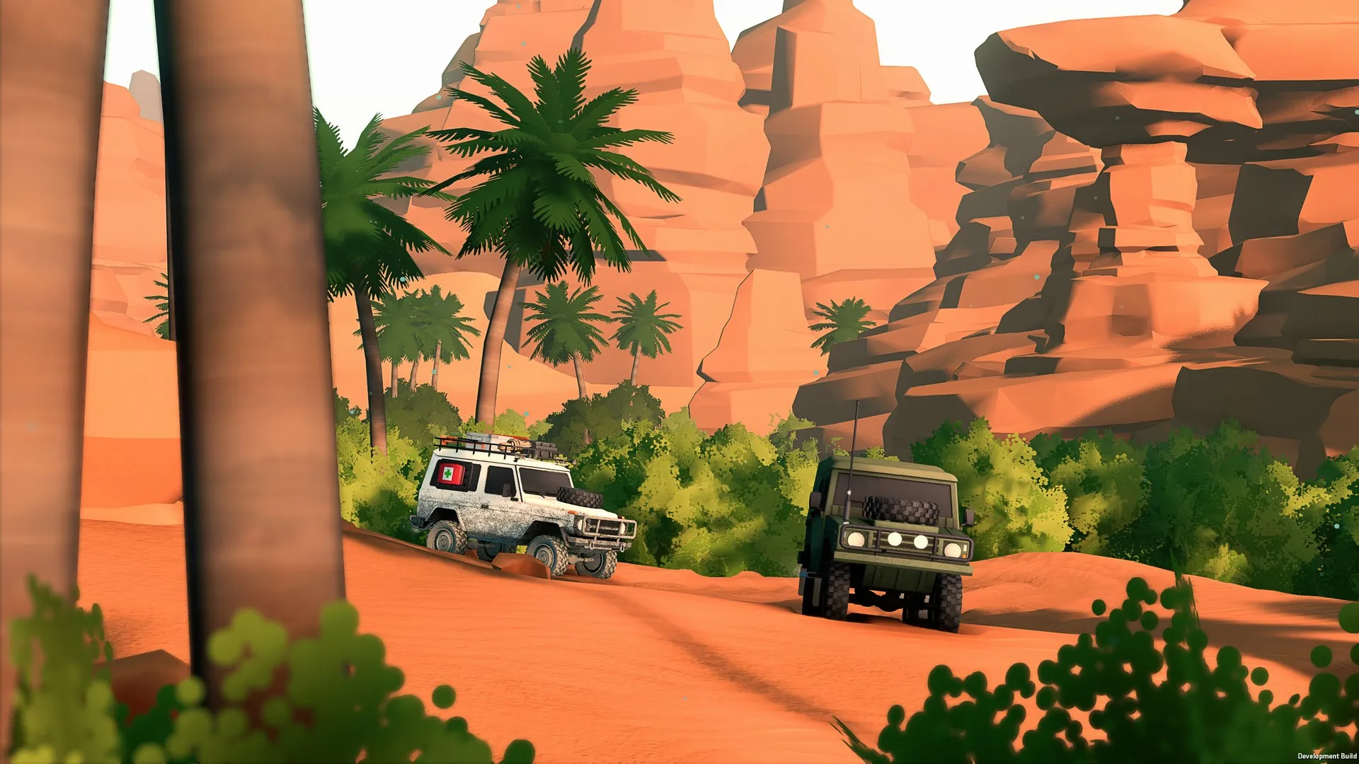 Multiple 4x4 in Over the Hill navigate Algeria's sand and trees